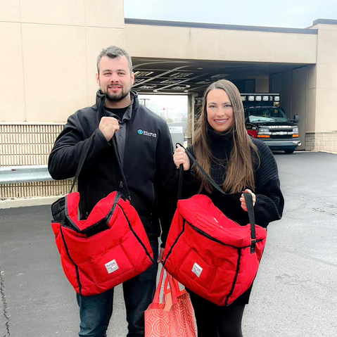 Volunteers delivering meals to seniors